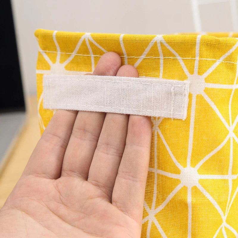 Détail des poignées du panier de rangement