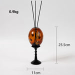 diffuseur huiles essentielles moderne motifs floraux dorés verre opaque décoration intérieure accessoires salon contemporain