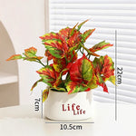 plantes artificielles vertes moderne pots blancs décoration intérieure feuilles variées minimaliste