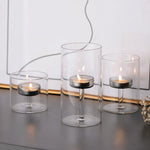 bougeoir transparent moderne bougie allumettes pied central table fête