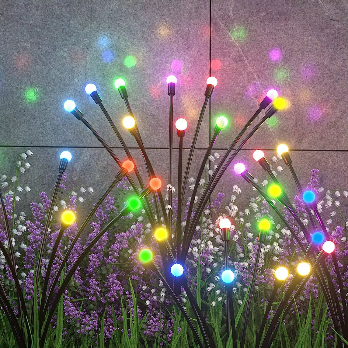 guirlande lumineuse solaire têtes led blanc vert bleu rose orange moderne inserée sol