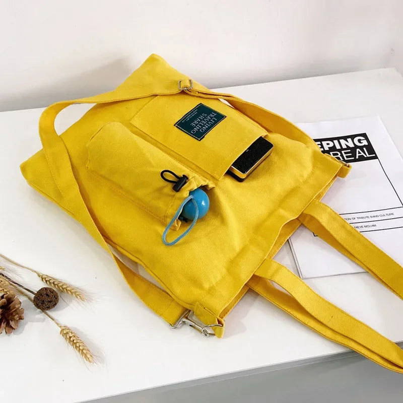 sac main uni jaune blanc vert noir moderne poignées détachables porte clés poche avant