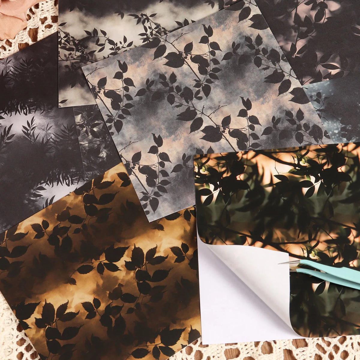 papier decoratif feuilles noires fond sombre feuilles blanches fond clair artisanal noir orange gris