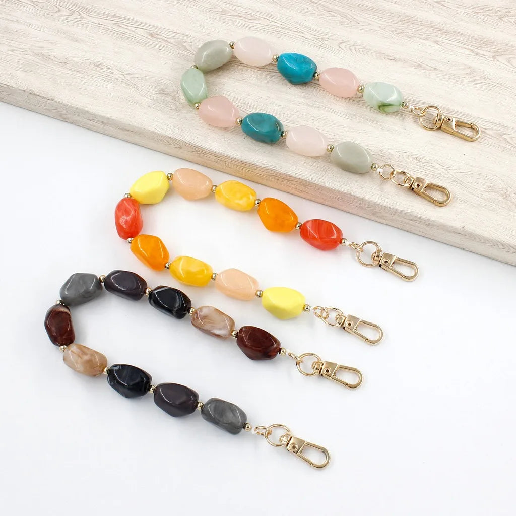 bracelet multicolore moderne ovale brillant bleu turquoise doré jaune orange rose vert marron gris
