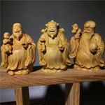 statues sculptées bois naturel artisanal traditionnel trois pièces bébé motifs floraux géométriques maison chambre