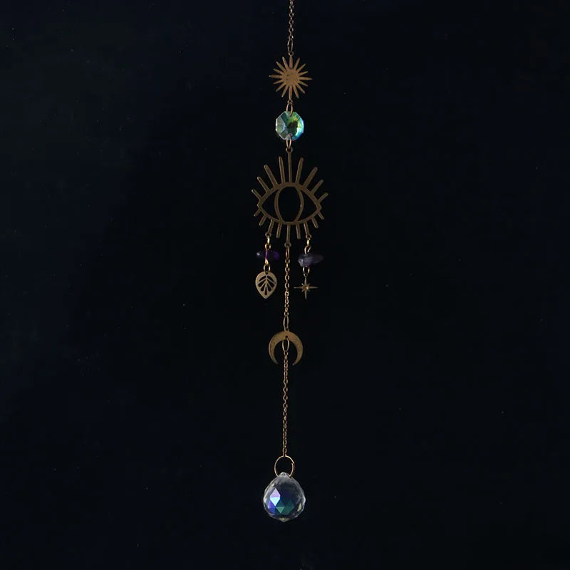 bijou pendentif cristal or bleu violet vert formes géométriques motifs oculaires translucides boho chic