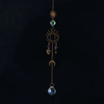 bijou pendentif cristal or bleu violet vert formes géométriques motifs oculaires translucides boho chic