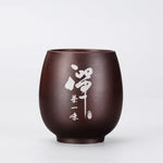 pot thé marron imprimé floral couvercle texte blanc classique traditionnel cordon boule bois épices