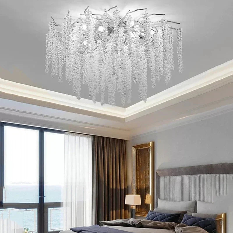 lustre moderne transparent branches goutte doré élégant illumination chambre salon