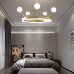 lampe suspendue moderne or blanc boules verre anneau central lumineux chaînes fixations