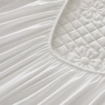 Housse de matelas dans différentes couleurs : blanc, bleu, vert
