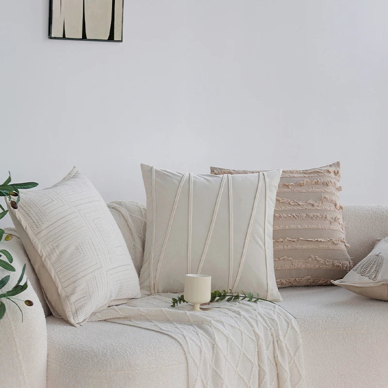coussin motif feuilles stylisées beige clair moderne opacité 45x45cm franges fixation