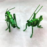 décoration créative insecte vert spirale métallique artisanal étagère unique adorable fait main exposé yeux