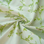 tissu brocart vert feuilles branches oiseaux motifs decoratifs polyester large 150cm variable opacity floral