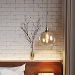 suspension lumineuse industrielle vintage ampoule filament verre transparent noir salon restaurant bar