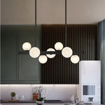 suspension lumineuse moderne or blanc boules translucides chaines interrupteur tactile