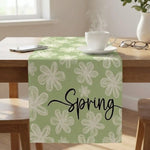 nappe table motif fleurs printemps calligraphie moderne bleu rose jaune vert blanc