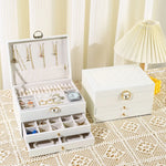 boîte bijoux cuir noir velours intérieur rangements classique poignées dorées bijoux organisation sécurité multifonctionnelle