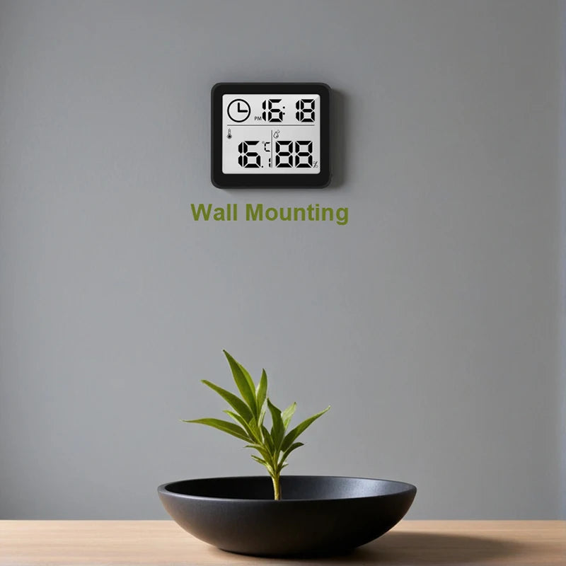 horloge numérique hygromètre blanc moderne affichage heure température humidité symbolique thermomètre minimaliste