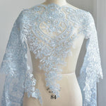 étole élégante broderie fine motifs floraux géométriques polyester translucide rose pâle bleu clair vert