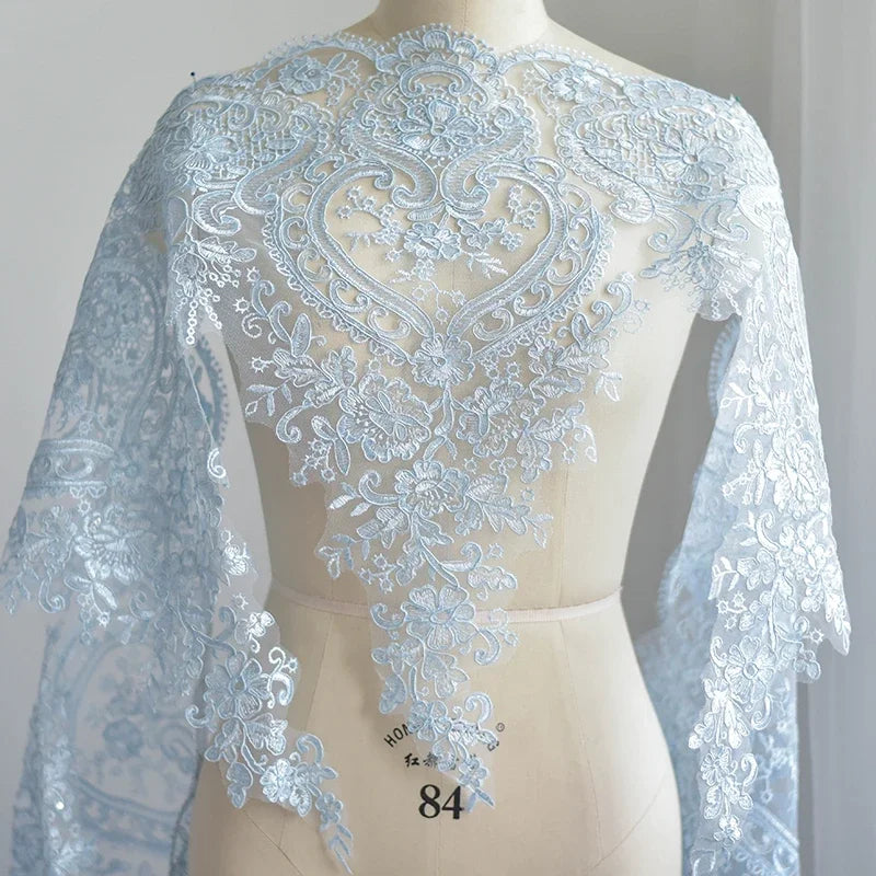étole élégante broderie fine motifs floraux géométriques polyester translucide rose pâle bleu clair vert