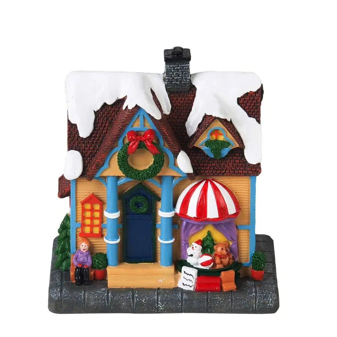 Détail de la peinture à la main sur la maison de Noël