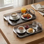 plateau repas moderne argenté assiettes tasses théière fruits bougie magazine vintage