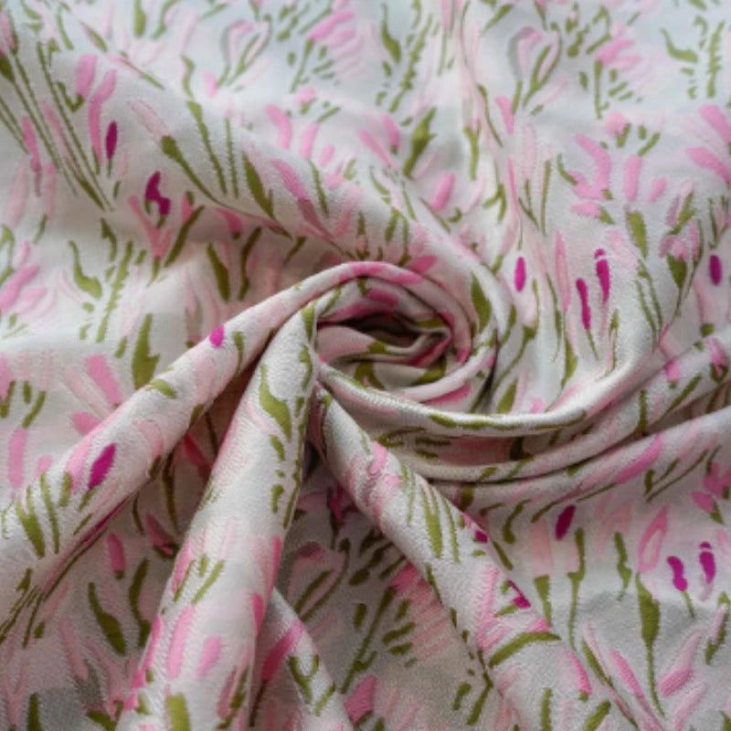 tissu polyester fleurs stylisées rose blanc imprimé protection uv largeur 150cm texture rugueuse occasionnels
