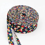 ruban coton motif floral rouge vert bleu blanc couture artisanale décoration textile