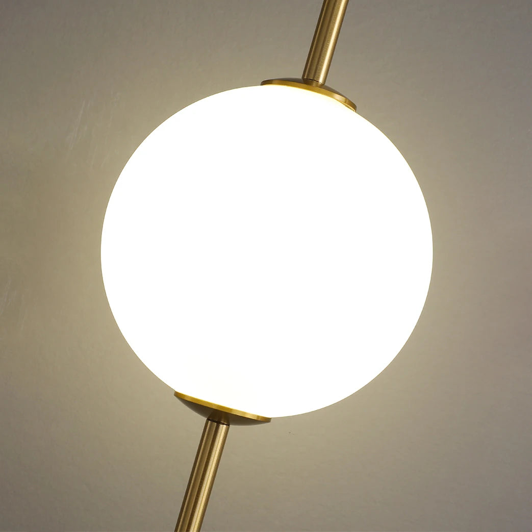 suspension lumineuse moderne blanc doré sphères translucides câble suspendu minimaliste trois leds chambre salon