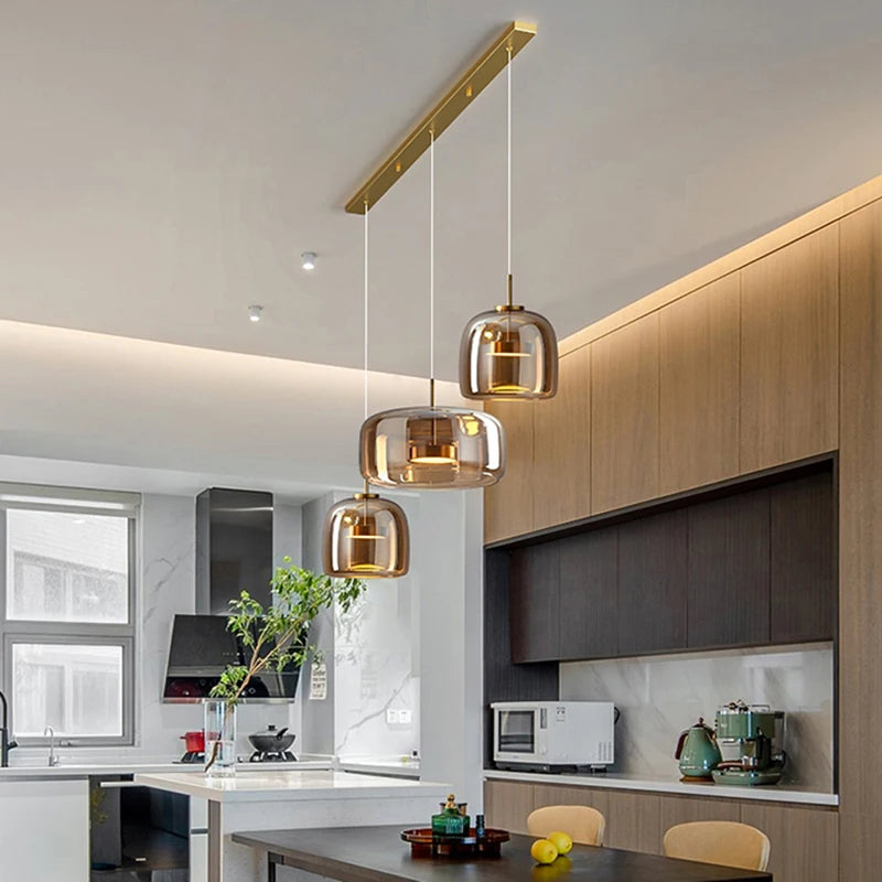 luminaire suspension moderne verre transparent doré câble salon salle manger