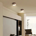 lampe moderne minimaliste bois pierre texture naturelle beige brun foncé éclairage led murale