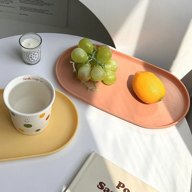 assiettes ovales modernes couleur beige rose vert jaune unies nourriture rangement gâteau biscuits fruits