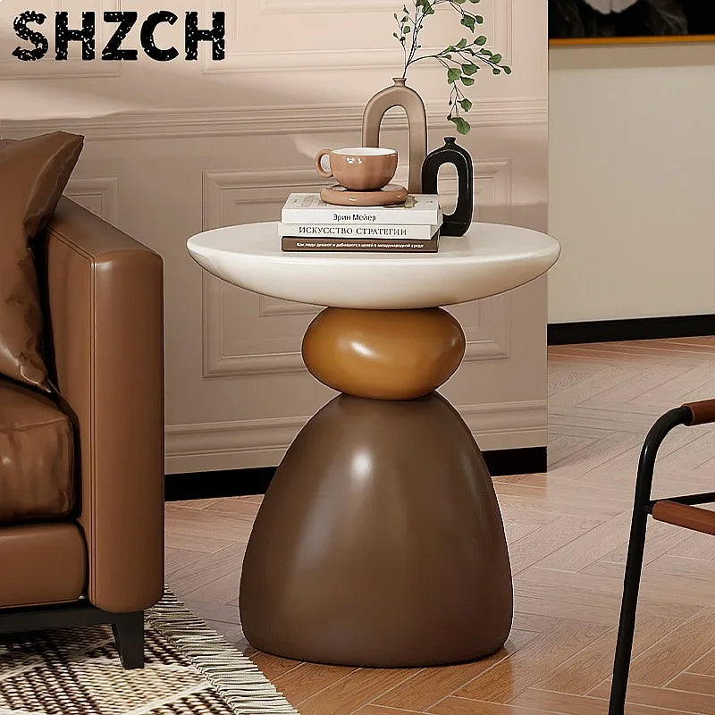 table basse ronde pierre moderne minimaliste sculptural couleur vive salon