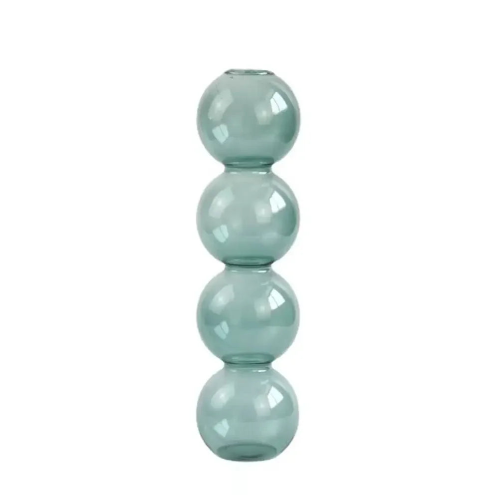 vase moderne transparent sphères empilées jaune clair rose bleu vert brun