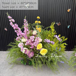 décoration murale naturelle composition florale variée couleurs vives rustique bienvenue mariage