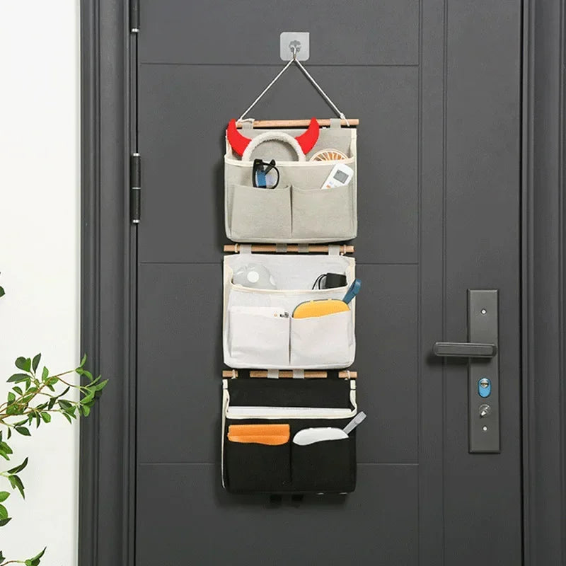 sac rangement mural gris toile coton clips adhésifs compartiments poignées bois moderne