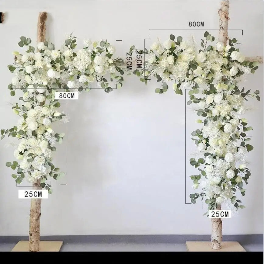 Arche décoration romantique fleurs artificielles feuilles vertes tissu blanc translucide extérieur mariage anniversaire