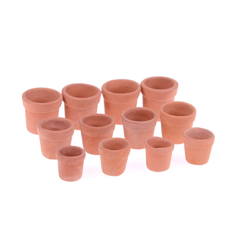 pots terre cuite miniature rustique fleurs jaunes centre foncé maison poupée décoration intérieure jardin