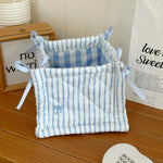 panier rangement tissu polyestère bleu clair rayures horizontales pliable utilisation multiple moderne décoratif rubans