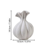 vases céramique texturé moderne minimaliste fougères séchées décoration intérieure arrondis lignes verticales blanches brunes