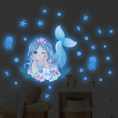 Autocollant mural avion lumineux bleu dans une chambre de fille