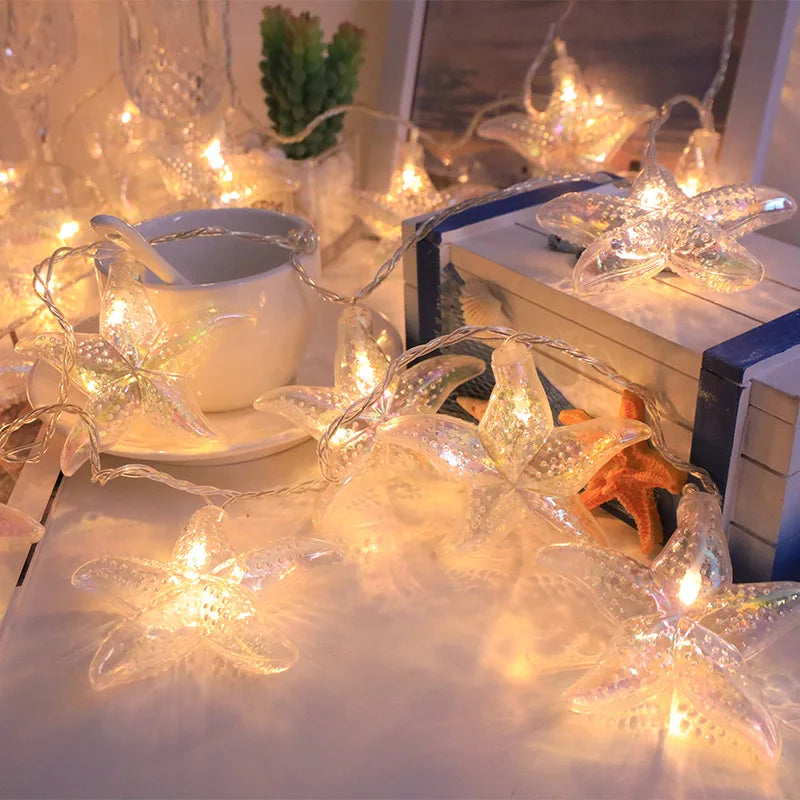 décoration intérieure guirlande lumineuse étoile mer coquillage thème marin festif anniversaire noël