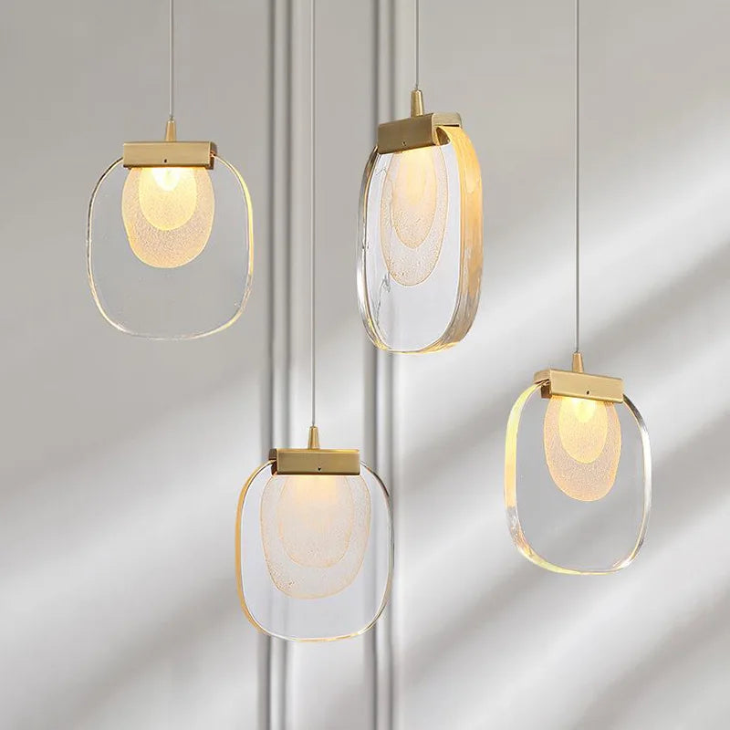 suspension lumineuse moderne transparent dorée fine élégante chaînes métalliques ampoules incluses