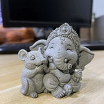 statuette artisanale figurine éléphant gris texture granulée décoration maison prière