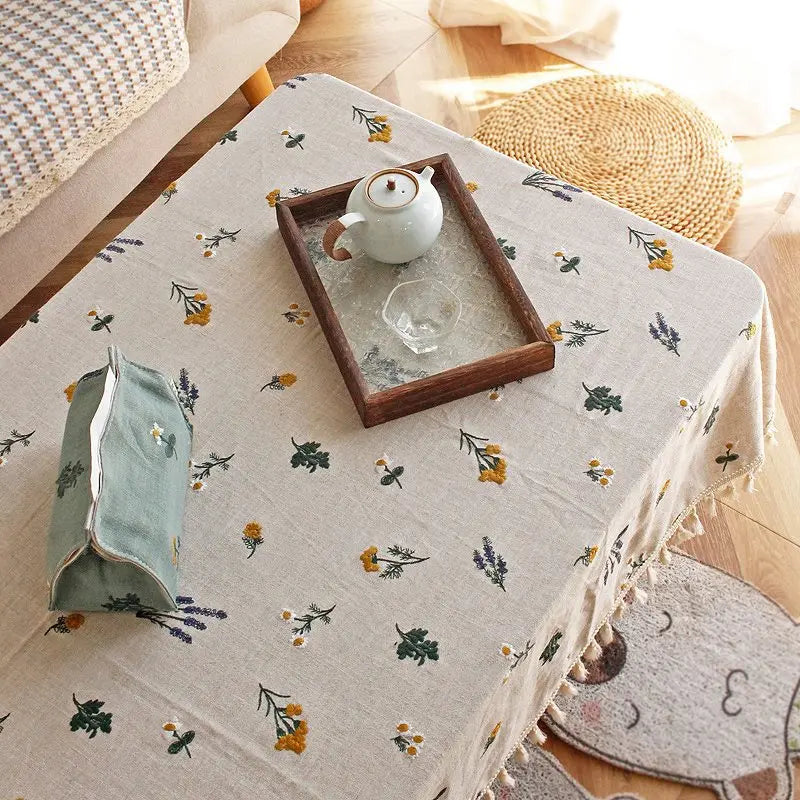 nappe coton brodée fleurs verte jaune violette rustique serviettes assorties tissage uni opaque salon