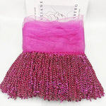 jupe déguisement sequins dorés ruban fixation largeur 16cm polyester violet rouge jaune rose vert