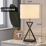 lampe sol moderne abat jour tissé structure géométrique noir doré led minimaliste