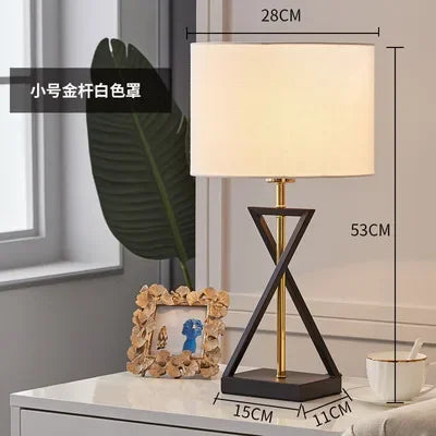lampe sol moderne abat jour tissé structure géométrique noir doré led minimaliste