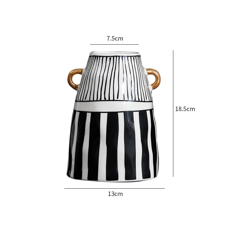 vase céramique rayures noires blanches moderne décoration intérieure arrangement fleurs artificielles minimaliste